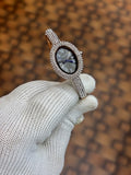 Cartier Baignoire watch in 18k rose gold with a diamond set bezel and bracelet