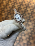 Cartier Baignoire watch in 18k rose gold with a diamond set bezel and bracelet
