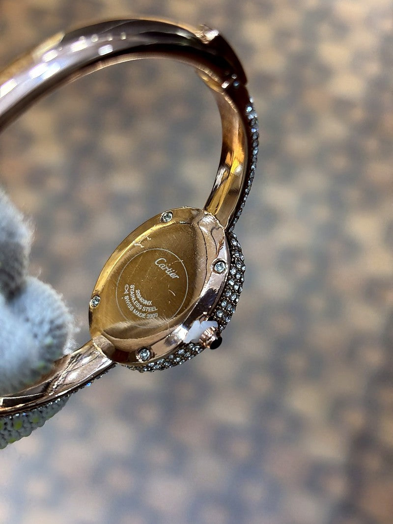 Cartier Baignoire watch in 18k rose gold with a diamond set bezel and bracelet