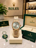 Rolex Datejust – Two-Tone Green Roman Dial
