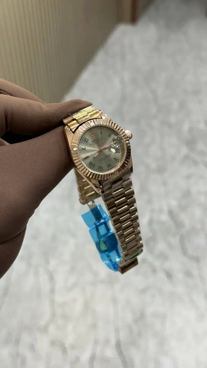 Rolex Datejust – Two-Tone Green Roman Dial