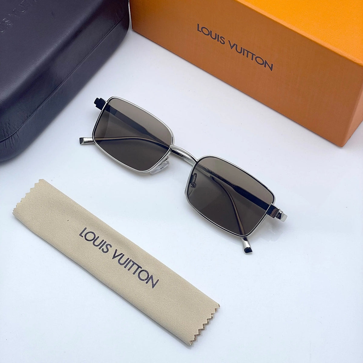 Louis Vuitton 3214 silver brown